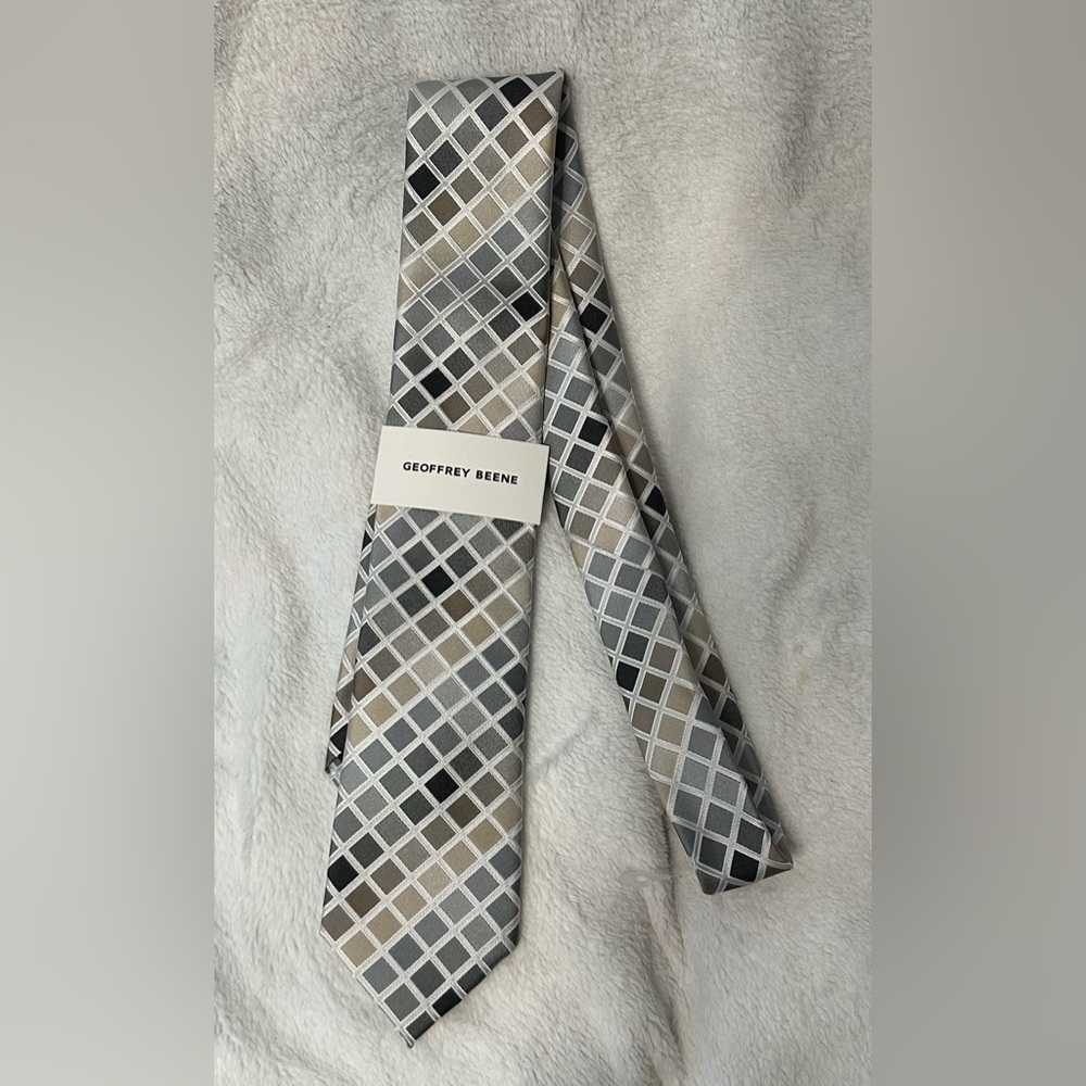 Geoffrey Beene men's necktie featuring a multi-colored diamond or grid pattern